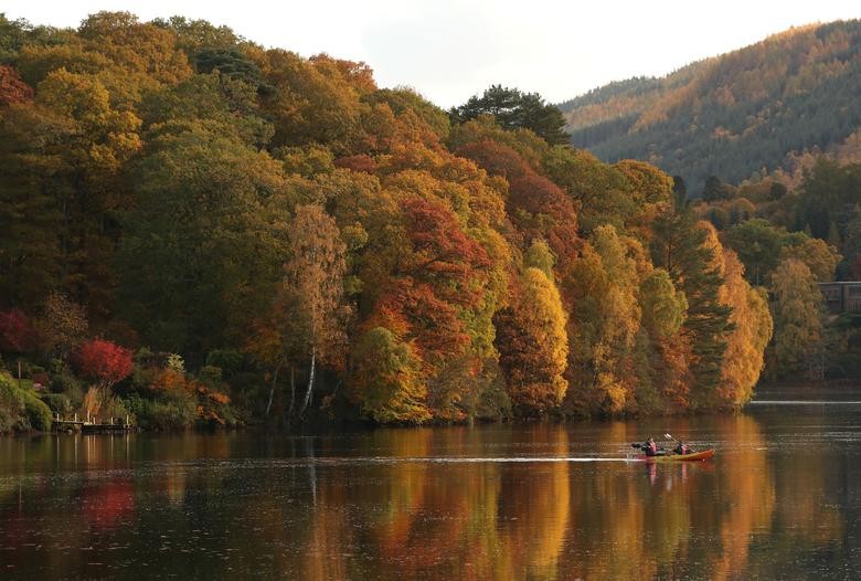 People kayak in Loch Faskally, Pitlochry, Scotland, Britain October 23, 2020. REUTERS/Russell Cheyne